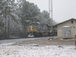 Tight shot of CSX Q615 power at the LaGrange agency as they set out plastic pellet cars in snow